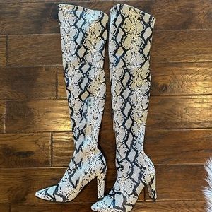 Snake print over the knee boots